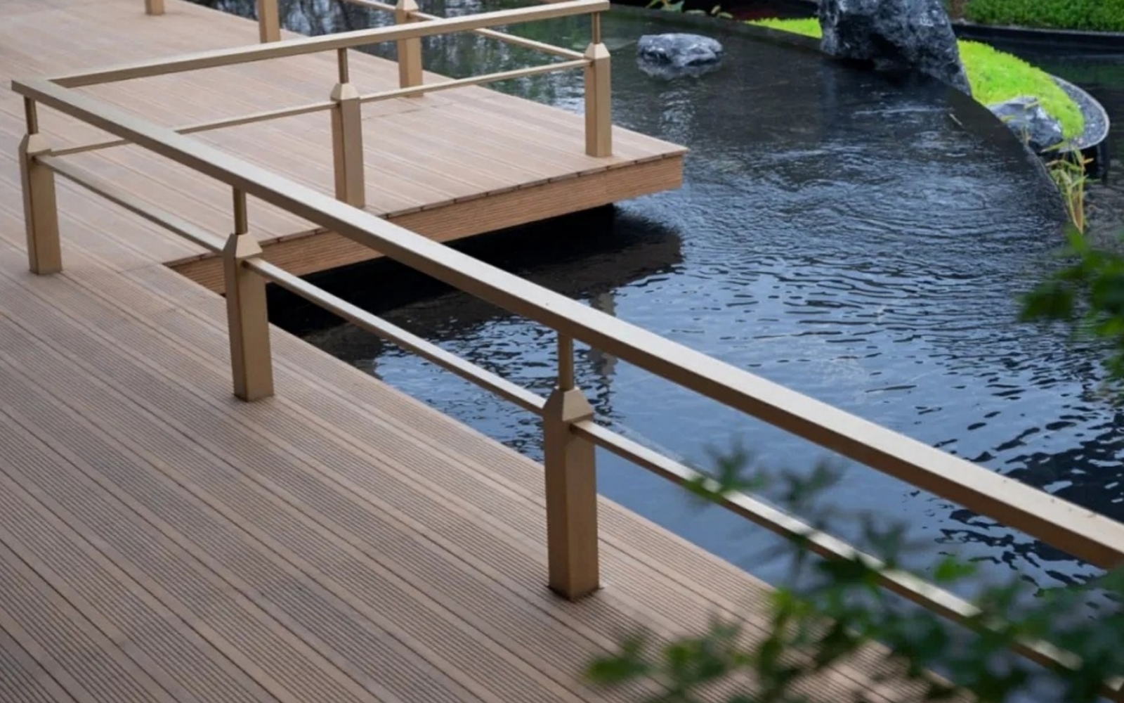 What are the applications of wood-plastic composite materials in outdoor landscaping?